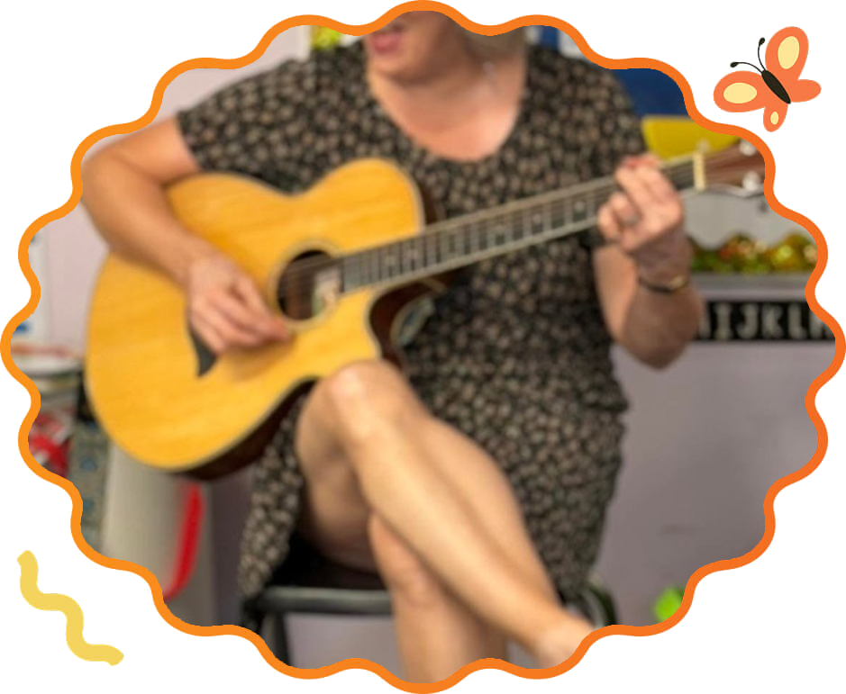 Music time with guitar in a Sunny Pointe classroom