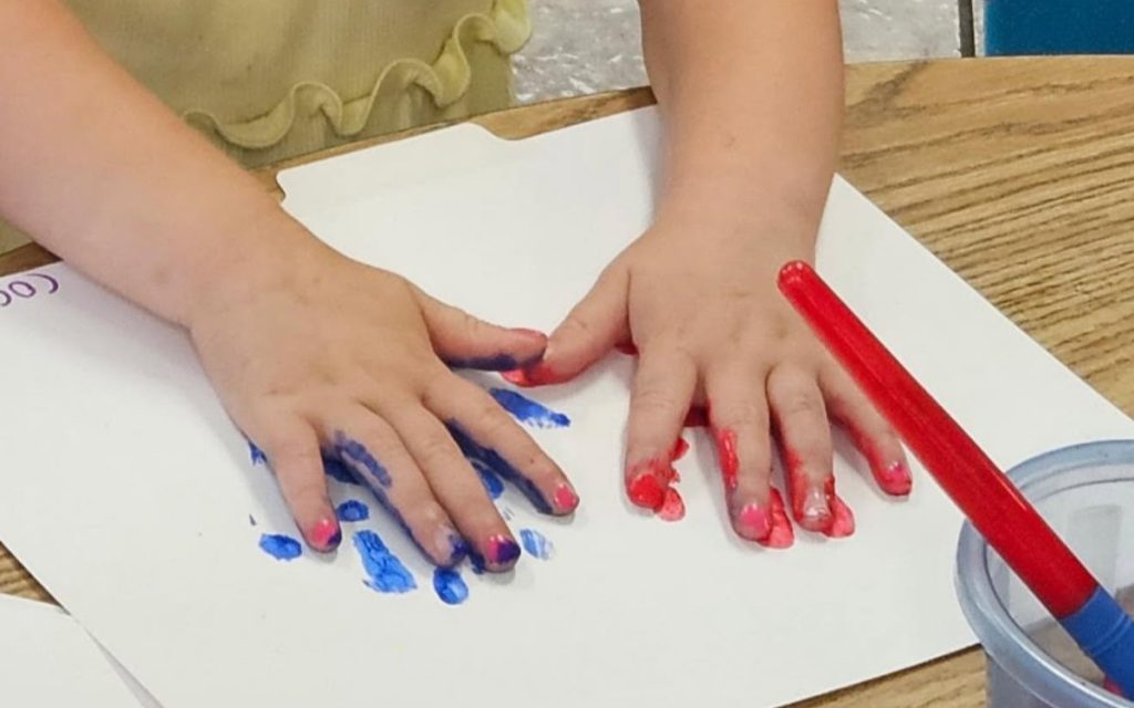 Handprint painting at Sunny Pointe